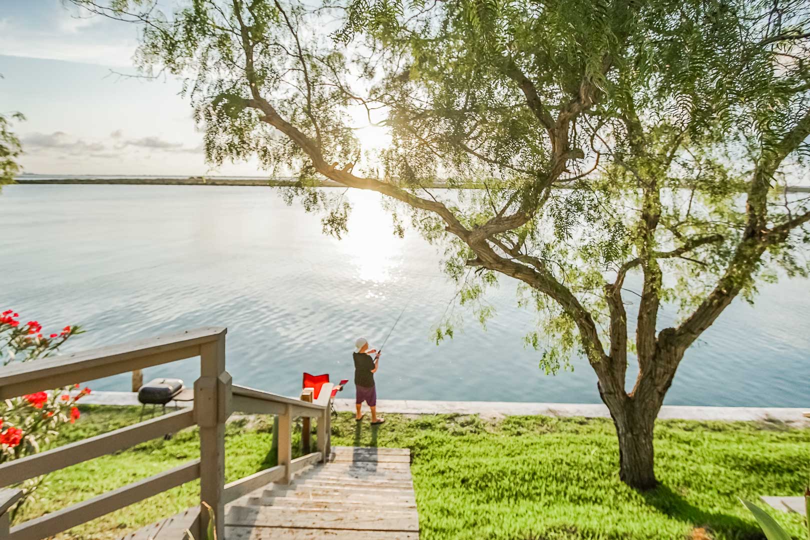 A peaceful lakeside view at VRI's Puente Vista Resort in Texas.